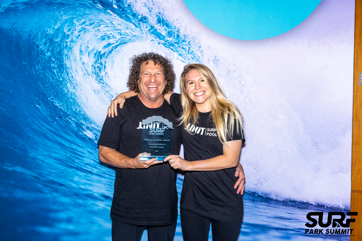 Tony FInn and Jessica OLeary accept Sustainable Impact Award for UNIT Surf Pool