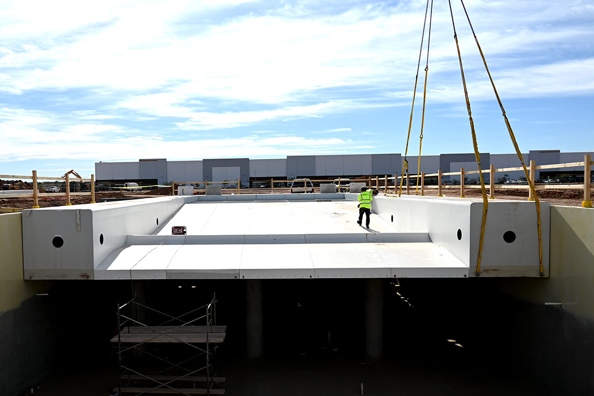 The last piece of Revel Surf Park's 10 meter embedded UNIT Surf Pool being installed.