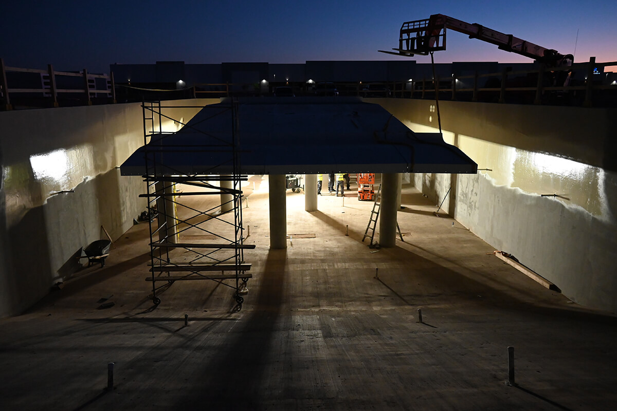 Late night UNIT Surf Pool installation session under the stars.