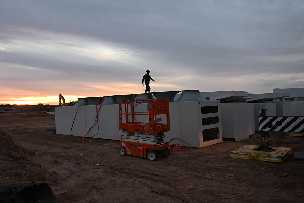 Sunrise starts at the construction site for UNIT Surf Pool installation at Revel Surf Park.